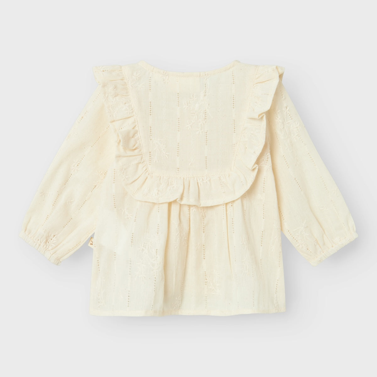 Stel de perfecte outfit voor je kleintje samen met de leuke baby rhody blouse in de kleur turtledove van het merk Lil' Atelier. Met deze schattige en veelzijdige blouse kun je alle kanten op! VanZus