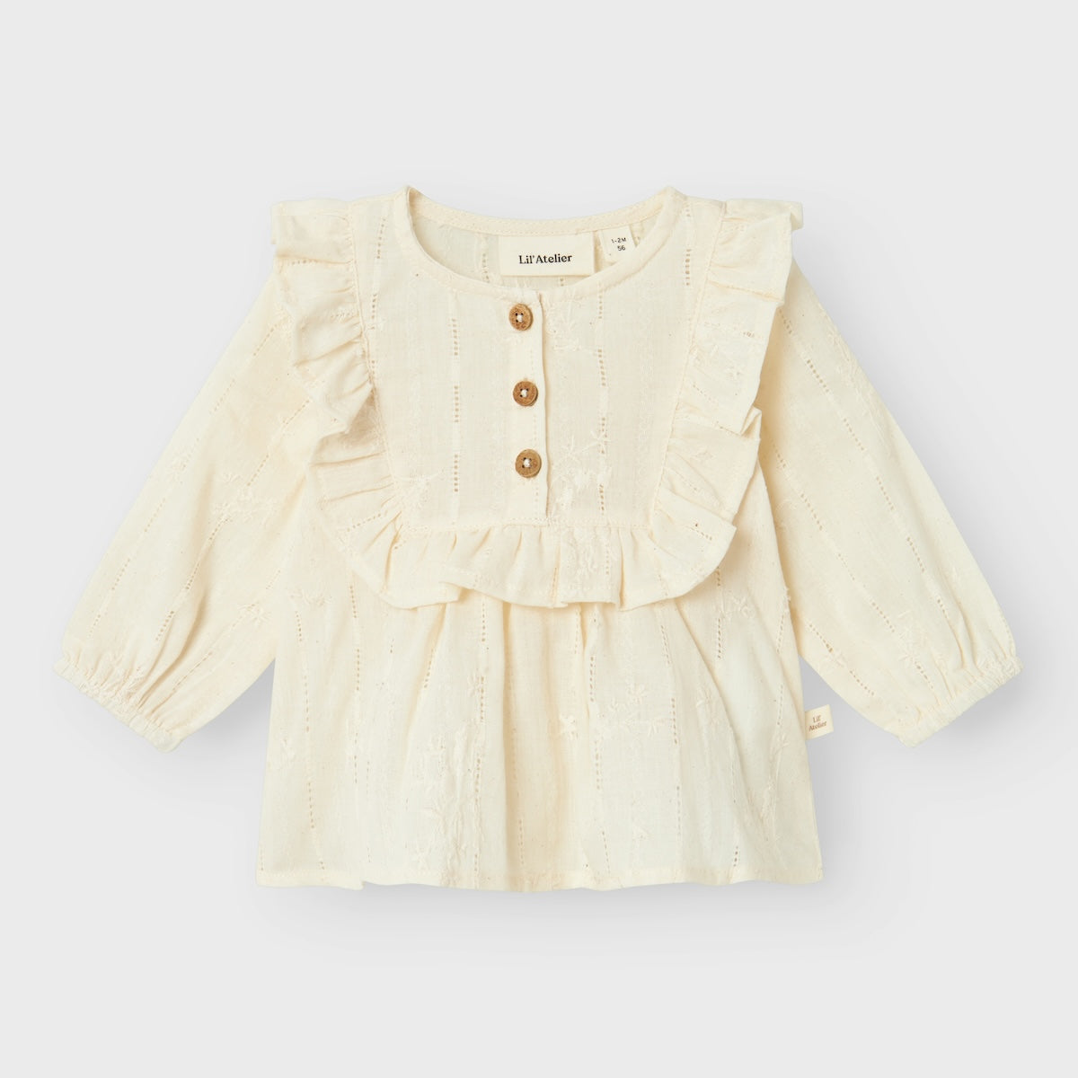 Stel de perfecte outfit voor je kleintje samen met de leuke baby rhody blouse in de kleur turtledove van het merk Lil' Atelier. Met deze schattige en veelzijdige blouse kun je alle kanten op! VanZus