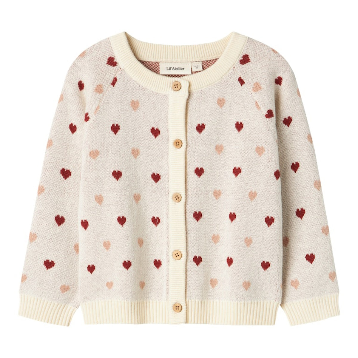 Hoe schattig is dit vestje met hartjes?! Dit saran knit vest heart turtledove van Lil' Atelier is een echte eyecatcher en maakt de outfit van je kleintje net een beetje warmer. Dit vestje heeft een prachtige off white kleur en is voorzien van gekleurde hartjes, waardoor het een echte blikvanger is. VanZus