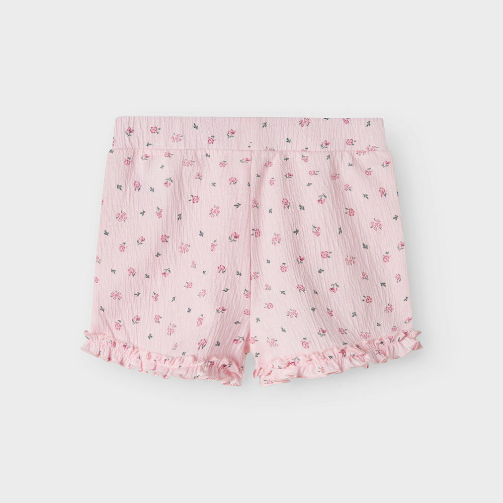 De jannis short in de kleur ballerina van het merk Name It is een schattige en comfortabele korte broek voor meisjes. Gemaakt van een zachte en soepele stof die perfect is voor zomerse dagen. VanZus
