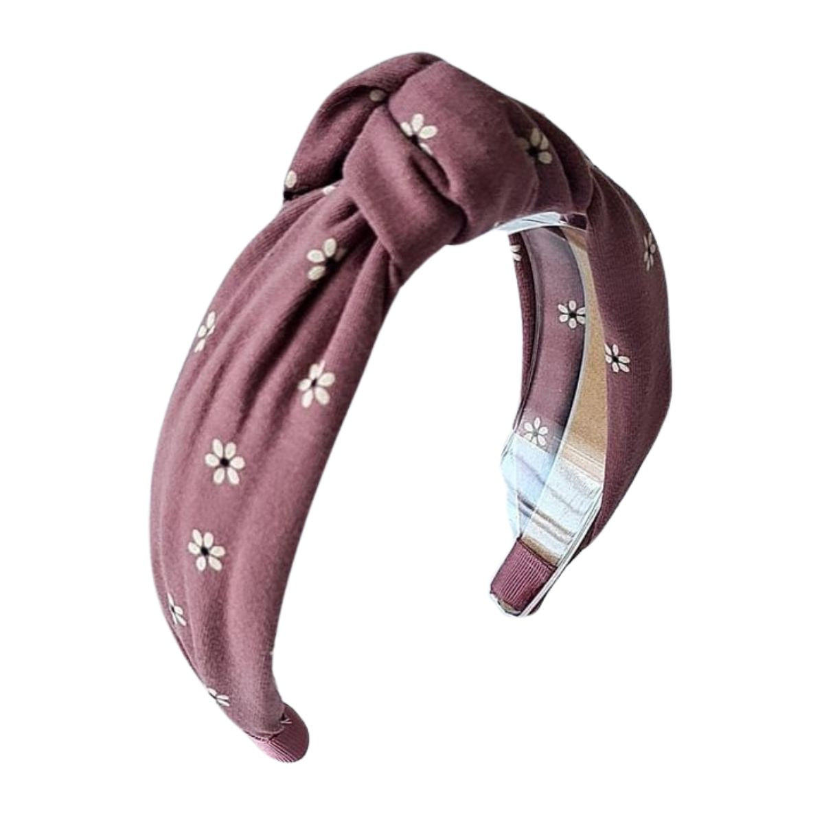 Style de look van jouw mini af met de mauve flower haarband van Navy Natural. De knotted diadeem met vrolijke bloemenprint geeft een echte retro vibe aan de looks van jouw kindje. VanZus