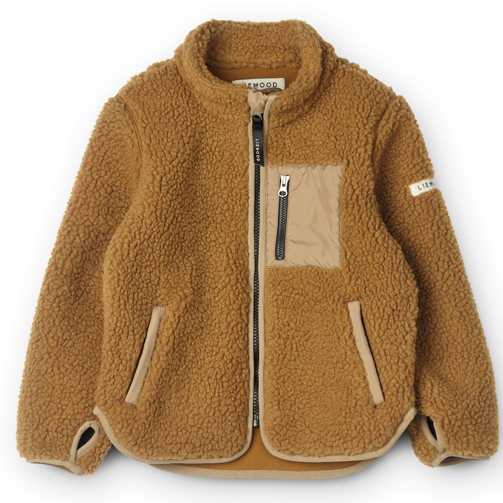 Ben je op zoek naar een fijne en stijlvolle fleece jas voor jouw kleintje voor de koudere wintermaanden? Dan is deze nolan fleece jas in mega golden caramel oat mix een echte must have. VanZus