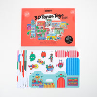 Bouw je eigen pop-up stad met OMY’s paper toys city. De set van 13 huizen, 5 voertuigen en meer elementen zorgt voor veel speelplezier! Creatief en leerzaam. Geschikt voor kinderen vanaf 6 jaar. VanZus