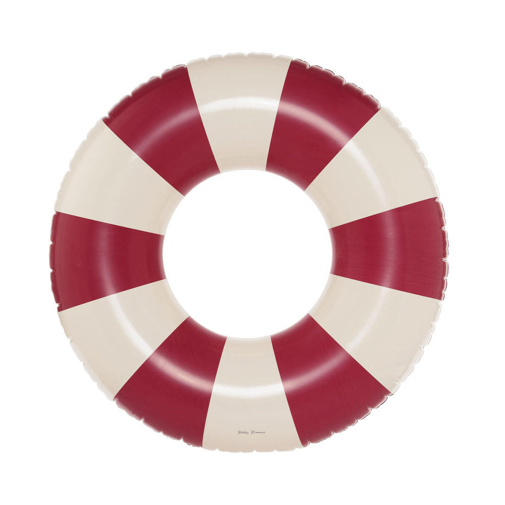 De Petites Pommes Celine zwemband in de kleur ruby red is een opblaasbare zwemband met een diameter van 120cm. Met deze zwemring kan jouw kindje heerlijk relaxen en zwemmen in het zwembad of de zee. VanZus.
