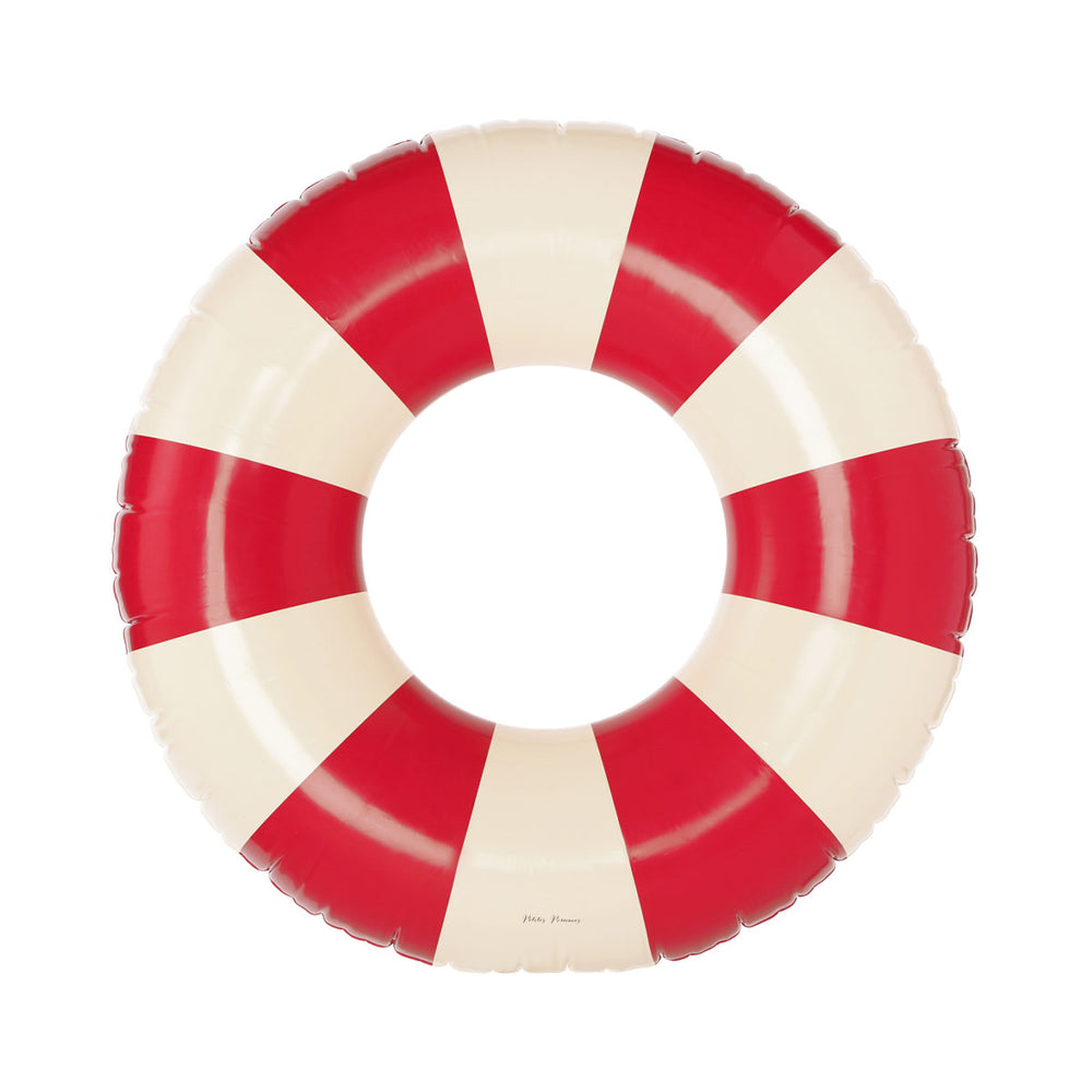 De Petites Pommes Celine zwemband in de kleur signal is een opblaasbare zwemband met een diameter van 120cm. Met deze zwemring kan jouw kindje heerlijk relaxen en zwemmen in het zwembad of de zee. VanZus.