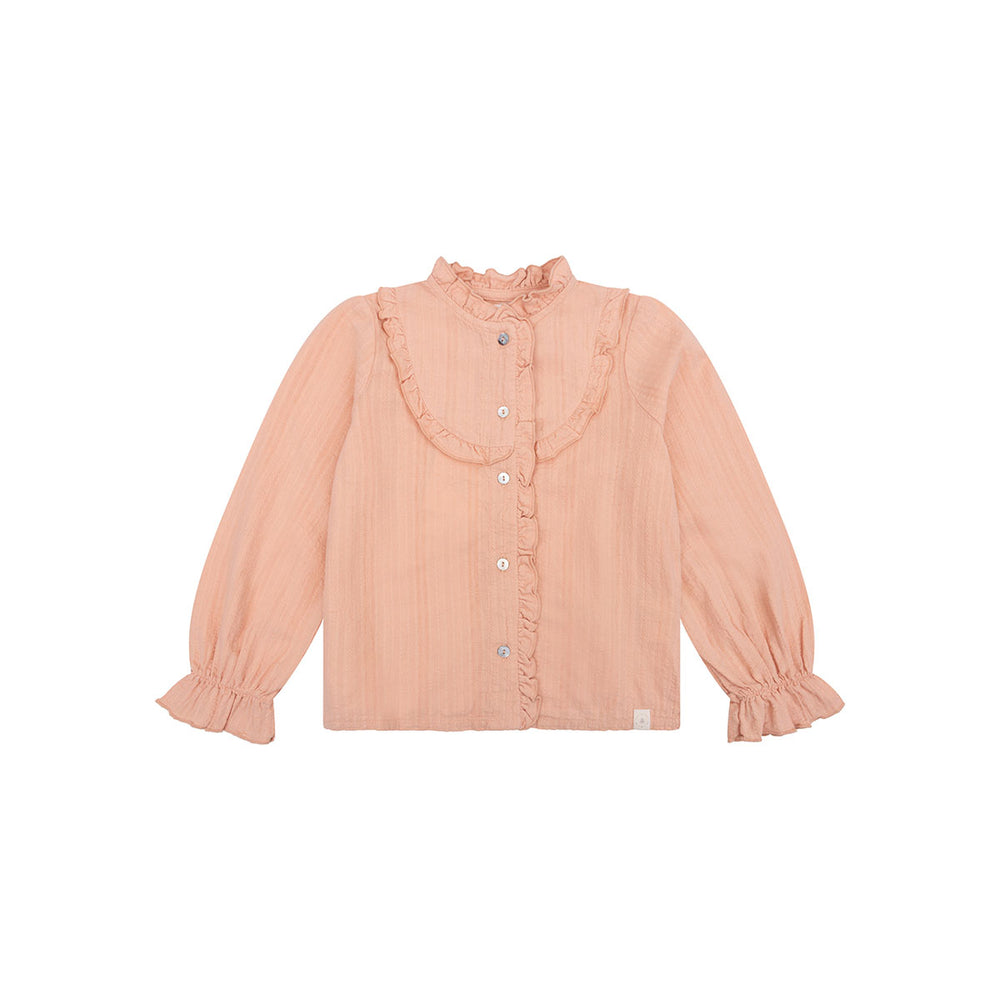 Dit lieve blousje wordt zeker weten een nieuw lievelings item van jouw kleine meid. De ruffle blouse in de kleur pink sand van het merk Navy Natural is namelijk een prachtig en styling blousje dat ook nog eens heel comfortabel zit! VanZus