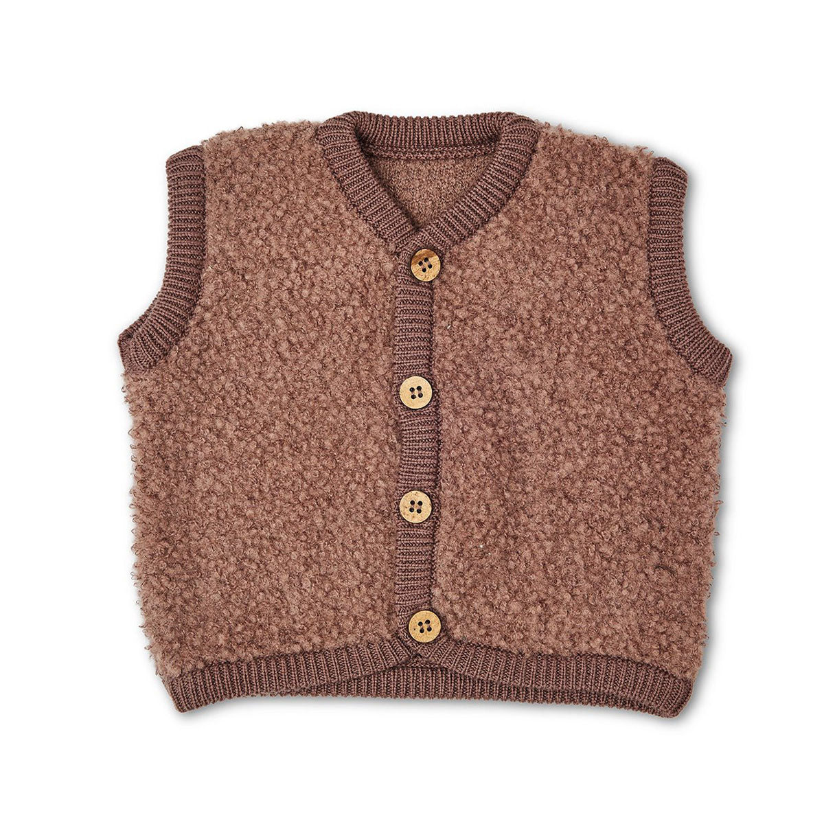 Houd je kleintje lekker warm met dit merinowol bouclé bodywarmer in de kleur rose brown van het leuke merk Smallstuff. Dit schattige vestje heeft een mooie roze kleur en schattige knoopjes aan de voorkant. VanZus