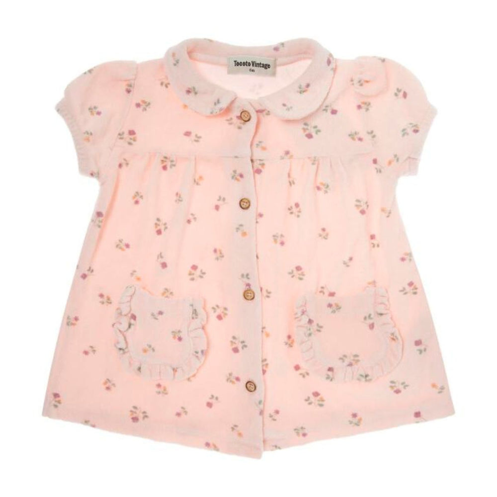 Dit is zo'n schattig jurkje! De flower terry baby jurk van Tocoto Vintage is een perfect babyjurkje voor in de zomer. De jurk is gemaakt van katoen, waardoor hij comfortabel aanvoelt. VanZus