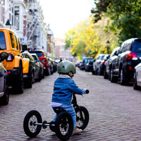 Bestel de Trybike steel 2-in-1 driewieler in de kleur all black en laat je kindje het plezier van fietsen ontdekken! Eenvoudig om te bouwen van een loopfiets naar een echte fiets. Duurzaam en veilig. VanZus