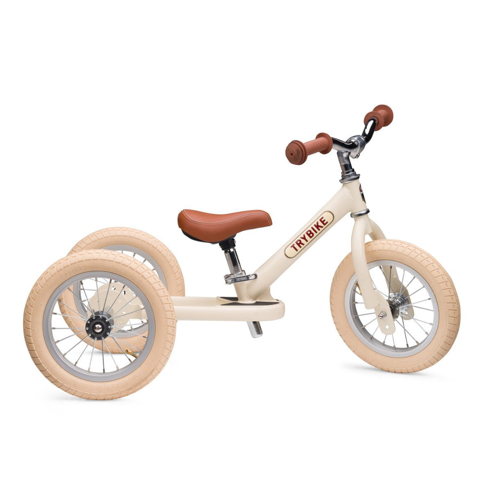 Bestel de Trybike steel 2-in-1 driewieler in de kleur cream vintage en laat je kindje het plezier van fietsen ontdekken! Eenvoudig om te bouwen van een loopfiets naar een echte fiets. Duurzaam en veilig. VanZus