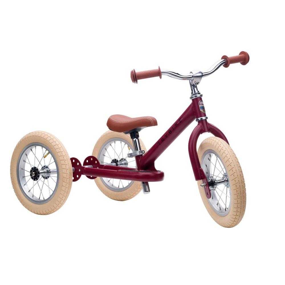 Bestel de Trybike steel 2-in-1 driewieler in de kleur mat rood en laat je kindje het plezier van fietsen ontdekken! Eenvoudig om te bouwen van een loopfiets naar een echte fiets. Duurzaam en veilig. VanZus