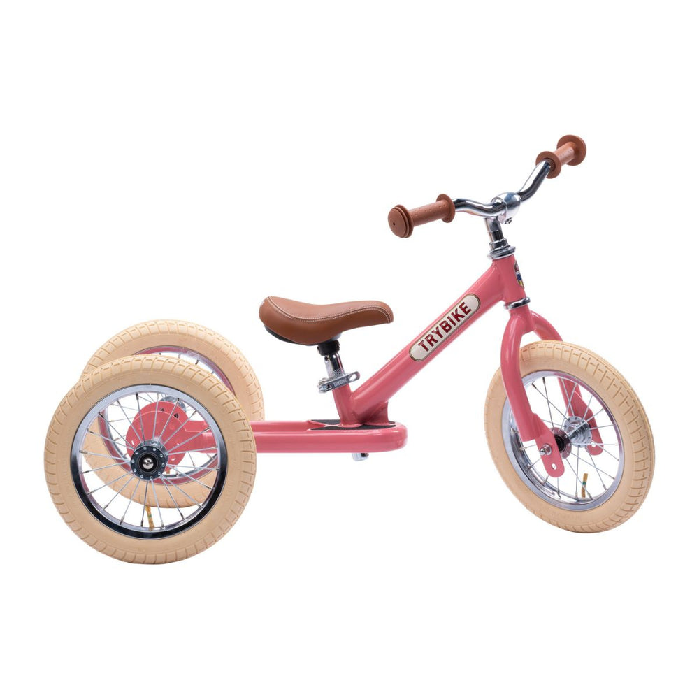Bestel de Trybike steel 2-in-1 driewieler in de kleur vintage pink en laat je kindje het plezier van fietsen ontdekken! Eenvoudig om te bouwen van een loopfiets naar een echte fiets. Duurzaam en veilig. VanZus