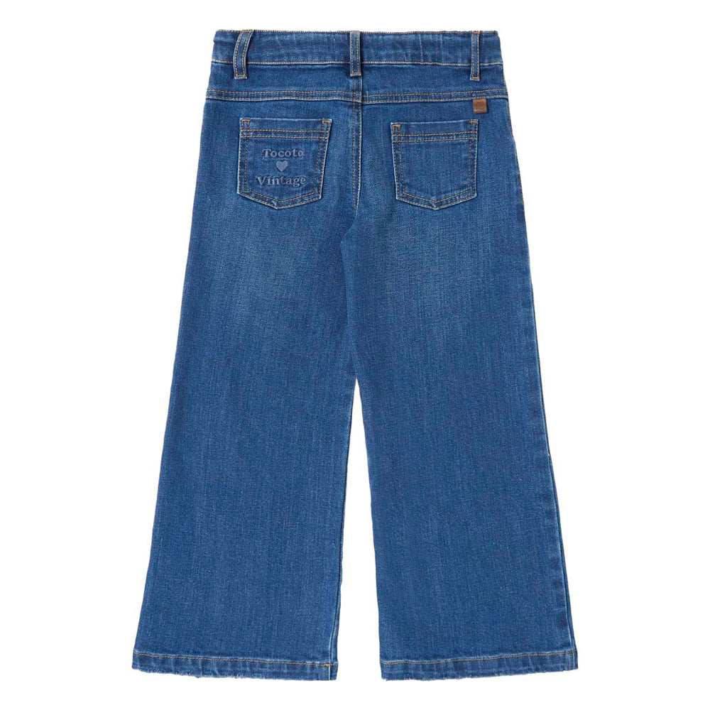 De Tocoto Vintage palazzo denim broek in de kleur blue is een must-have voor fashionista's. Gemaakt van zachte spijkerstof. Comfortabel, stoer en hip! In de maten 98 t/m 140. VanZus