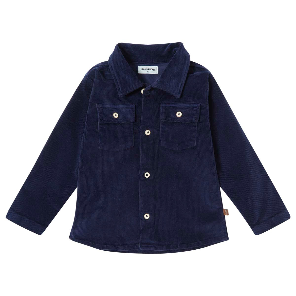 Het corduroy jasje azul marino van Tocoto Vintage is stoer en veelzijdig. Geschikt voor kinderen in maat 68-140, ideaal om te twinnen! Met mooie knoopjes en zakken. Ook beschikbaar in marron. VanZus