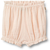 De Wheat angie bloomer shorts in de kleur rose water zijn een leuke aanvulling aan de lente/zomer garderobe van je dochtertje. Het shortje heeft een mooie zacht roze kleur, dit geeft hem een lieve uitstraling. VanZus.