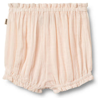 De Wheat angie bloomer shorts in de kleur rose water zijn een leuke aanvulling aan de lente/zomer garderobe van je dochtertje. Het shortje heeft een mooie zacht roze kleur, dit geeft hem een lieve uitstraling. VanZus.