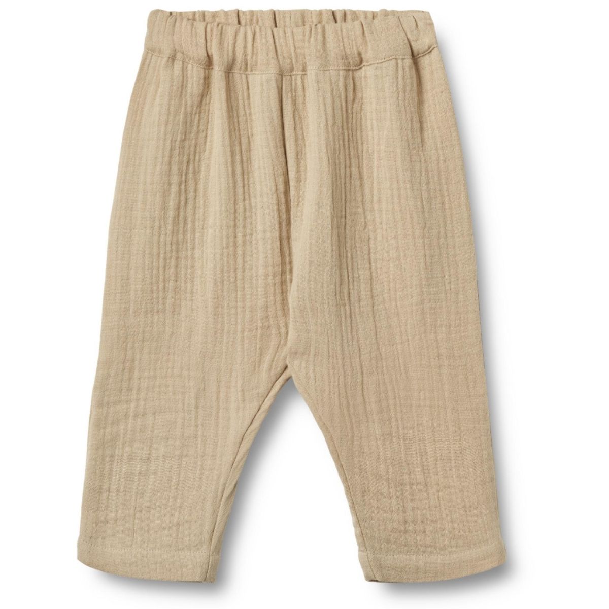 De Wheat ashley broek in de kleur soft sand is een heerlijke zachte broek voor je kleintje. Hij is gemaakt van biologisch katoen en lekker luchtig, perfect voor een lente- of zomerdag. VanZus.