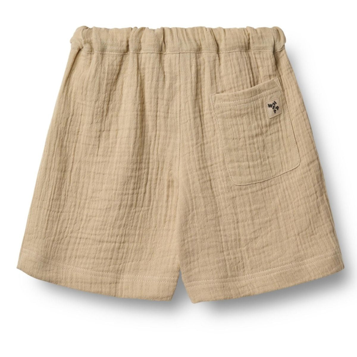 De Wheat atlasz shorts in de kleur soft sand zijn de perfecte toevoeging aan de lente/zomer garderobe van je zoon of dochter. De short heeft een wijde pasvorm en is daardoor heerlijk luchtig voor een zonnige dag. VanZus.