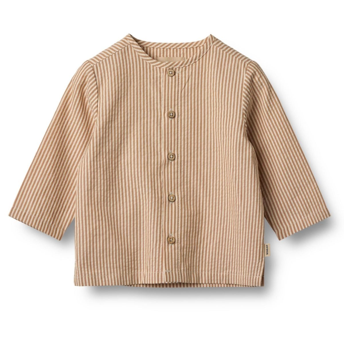 Het Wheat shelby shirt in de kleur caramel stripe is een super mooie toevoeging aan de garderobe van je kindje. Deze mooie blouse draagt heerlijk zacht en luchtig dankzij het biologische katoen. VanZus.