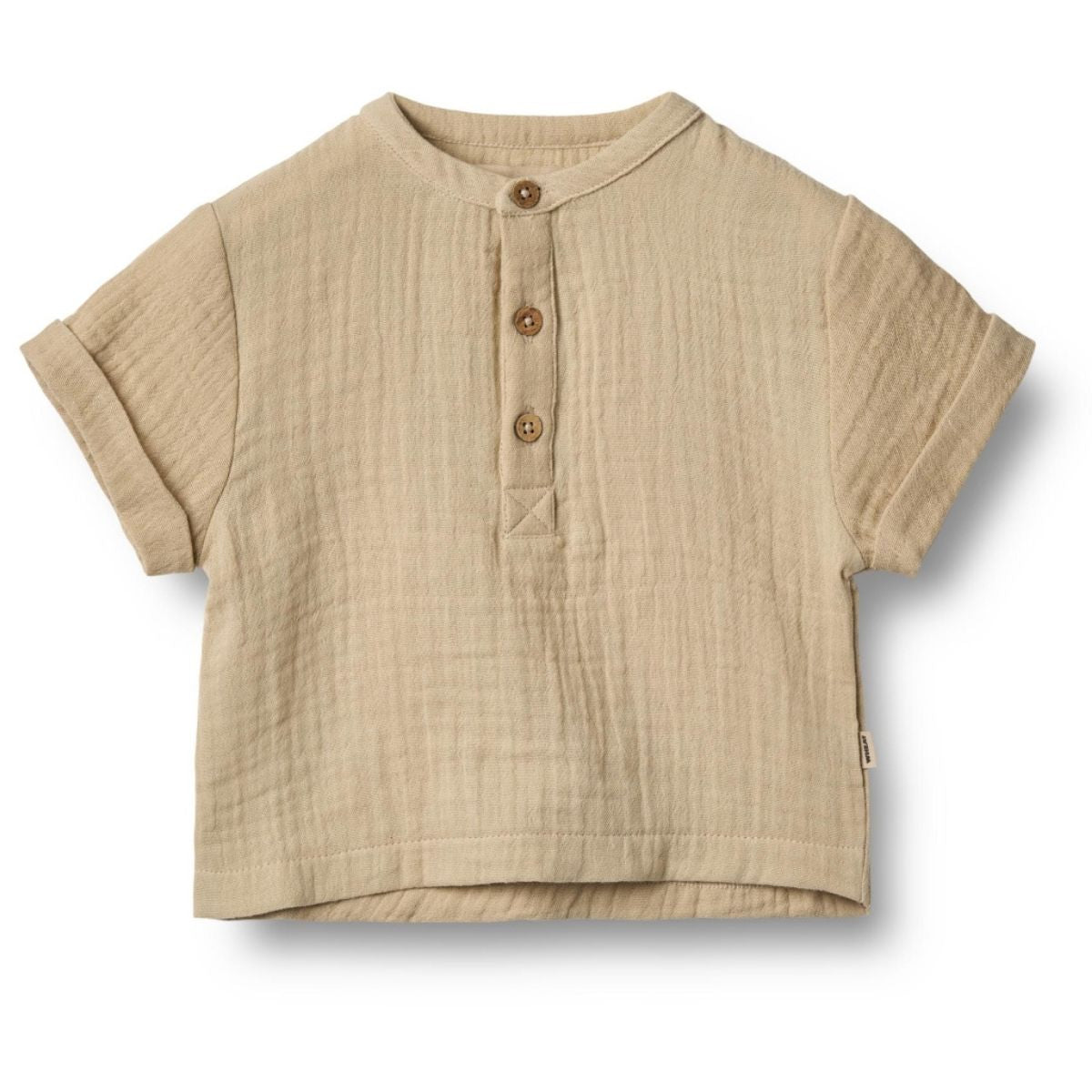 Het Wheat svend baby shirt in de kleur soft sand is een super leuk shirtje voor jouw kleintje. Het shirtje is gemaakt van heerlijk zacht biologisch katoen en draagt daardoor erg comfortabel. VanZus.