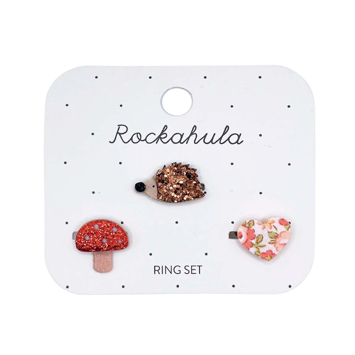 De set van Rockahula bestaat uit 3 hippe ringen uit de collectie hattie hedgehog. Versierd met een egel, hart en paddenstoel met subtiele glitter details en vrolijke kleuren. Verstelbaar. VanZus