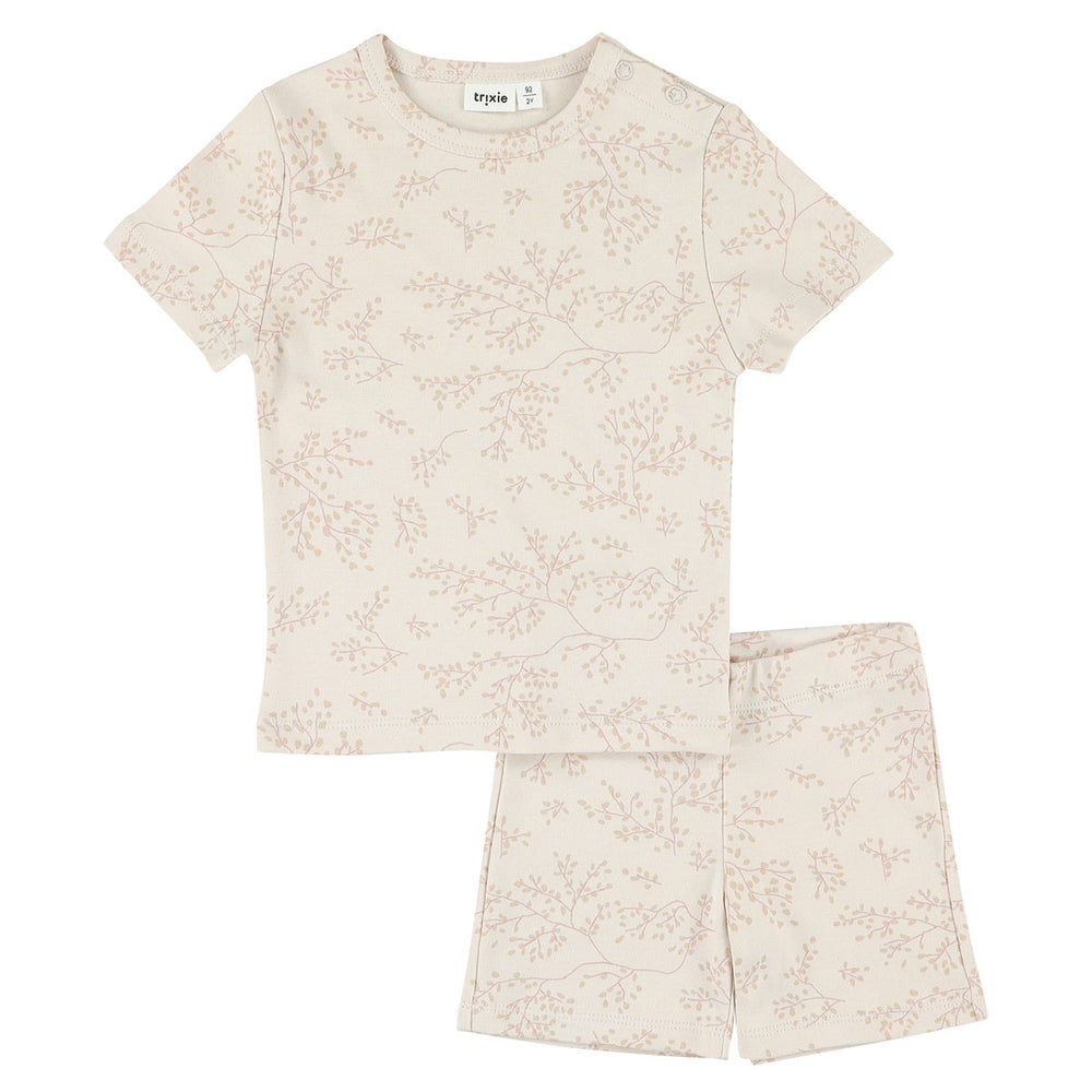 Laat jouw kleine ster ook 's nachts stralen met de Trixie 2-delige pyjama kort bright bloom. Deze lichtroze pyjama, gemaakt van 100% katoen, is bedrukt met een schattige bloemenprint. VanZus.