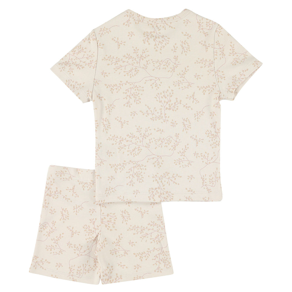 Laat jouw kleine ster ook 's nachts stralen met de Trixie 2-delige pyjama kort bright bloom. Deze lichtroze pyjama, gemaakt van 100% katoen, is bedrukt met een schattige bloemenprint. VanZus.