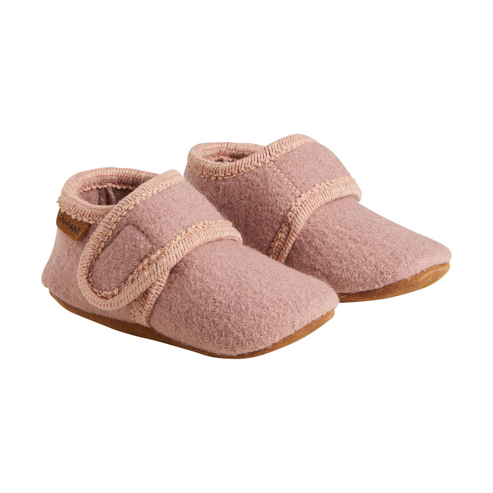 Dit zijn de En Fant wollen babysloffen bark: heerlijk, zachte wollen slofjes: een musthave voor je baby. De roze sloffen zijn heerlijk soepel en ademend en gemaakt van wol met een suède zool voor extra grip. VanZus.