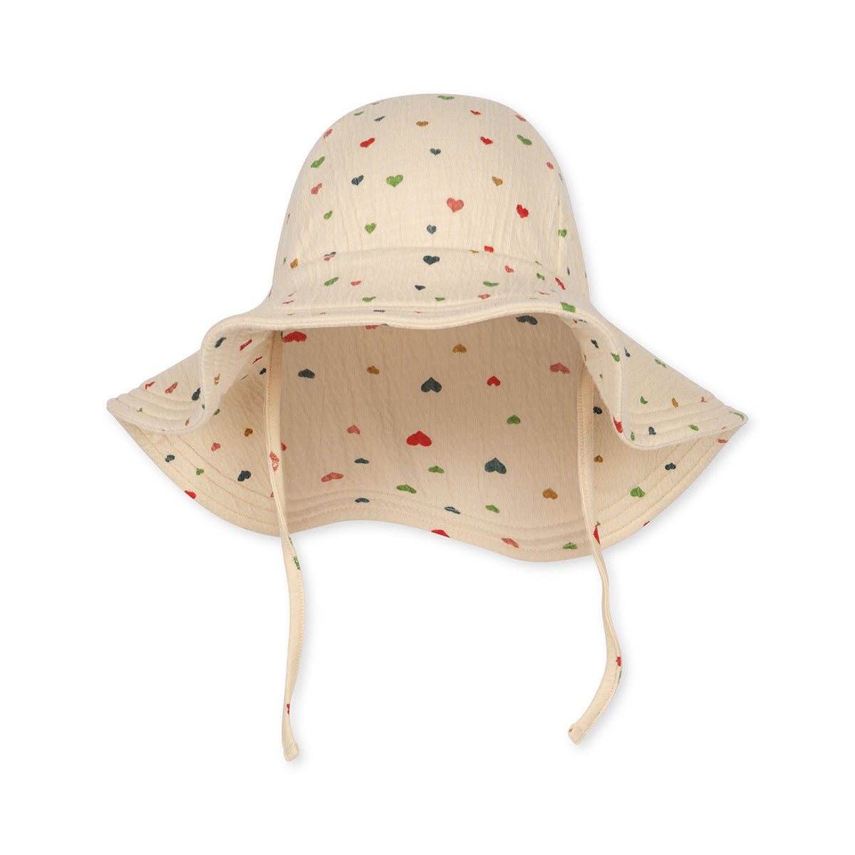 Bescherm het hoofdje van je kindje tegen de straling van de zon met de hippe Konges Slojd chleo sunhat multi hearts. Met strikbandjes onder de kin, zodat je dit zonnehoedje niet kwijtraakt. VanZus.