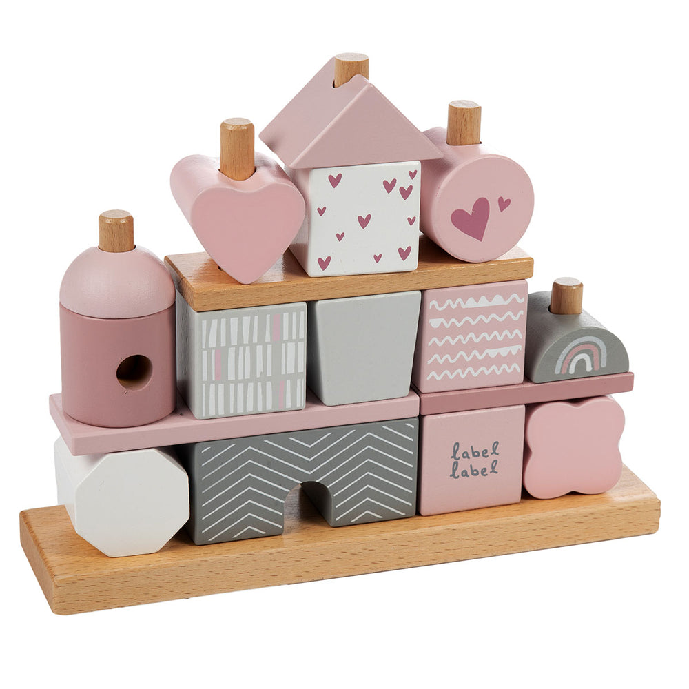 Deze Label Label stapelblokken huis roze staat als een huis, want dit is geen bouwblokkenset, nee dit is een stapeltoren met staven, waarover je kindje de verschillende vormen en kleuren blokjes kan schuiven. VanZus.